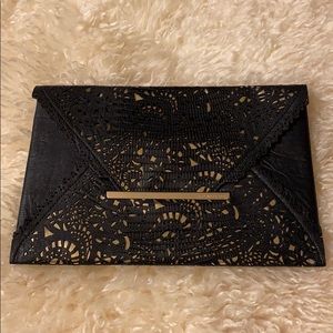 BCBG MACAZRIA black and gold envelope clutch